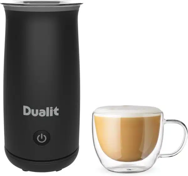 Dualit DA8414 handheld milk frother next to a cup of frothy latte.