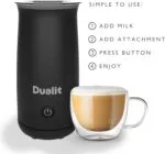 Dualit Handheld Milk Frother Next to a Cup of Cappuccino with Usage Steps Listed