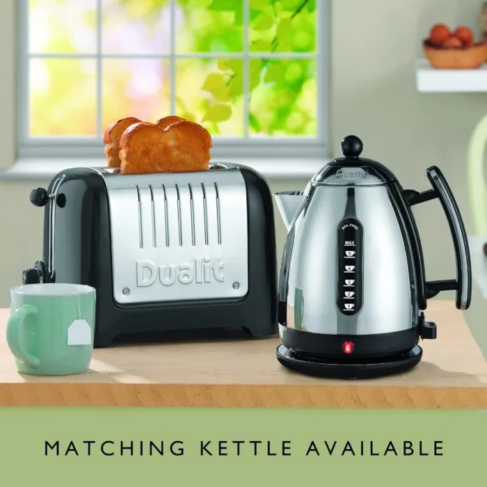 Dualit Da2625 2 Slice Lite Toaster in Black with Toast and Matching Kettle on Kitchen Counter